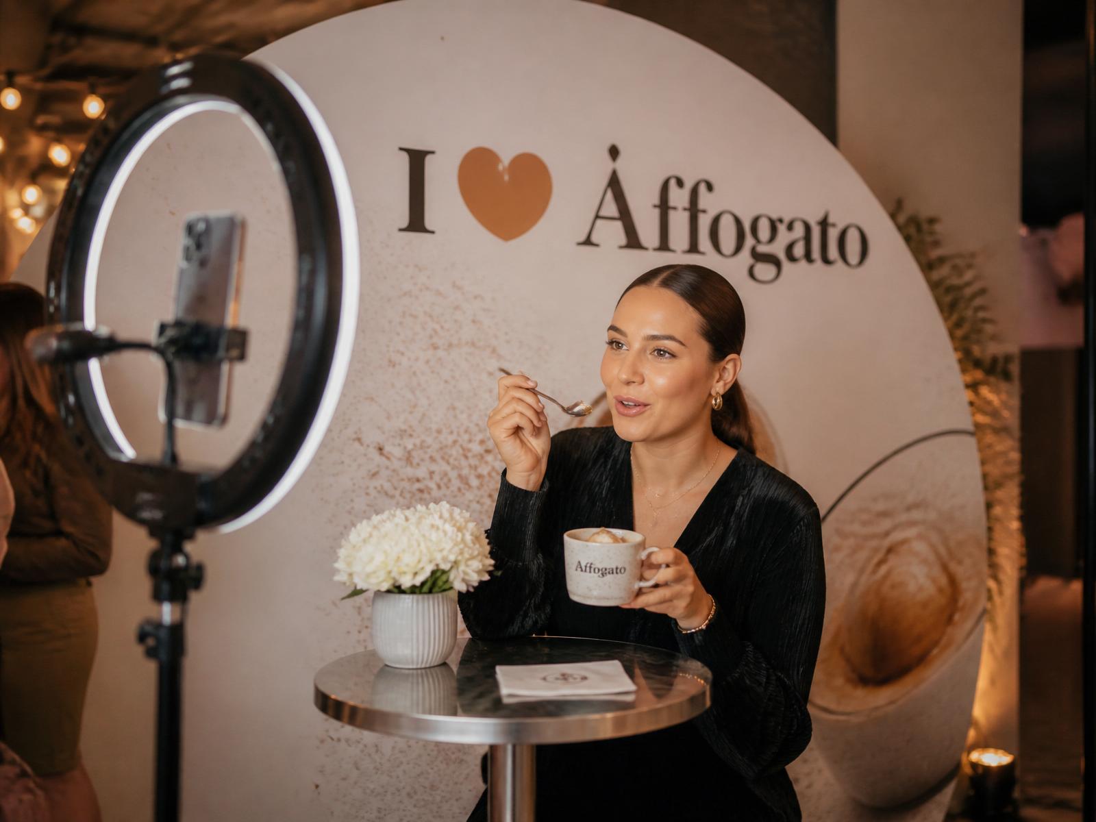Branded selfie station with ring light and backdrop